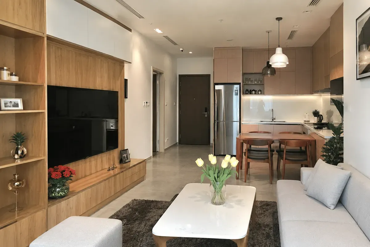 Không gian nội thất căn hộ chung cư 60m² phong cách hiện đại với phòng khách, bếp và phòng ăn thiết kế đồng bộ.