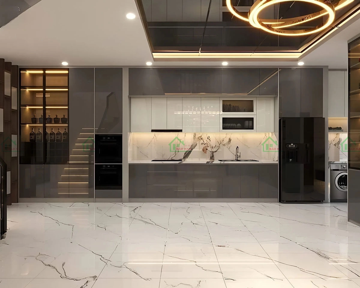 Tủ bếp acrylic màu xám phối trắng, tạo sự cân bằng giữa vẻ đẹp hiện đại và sự tinh tế.