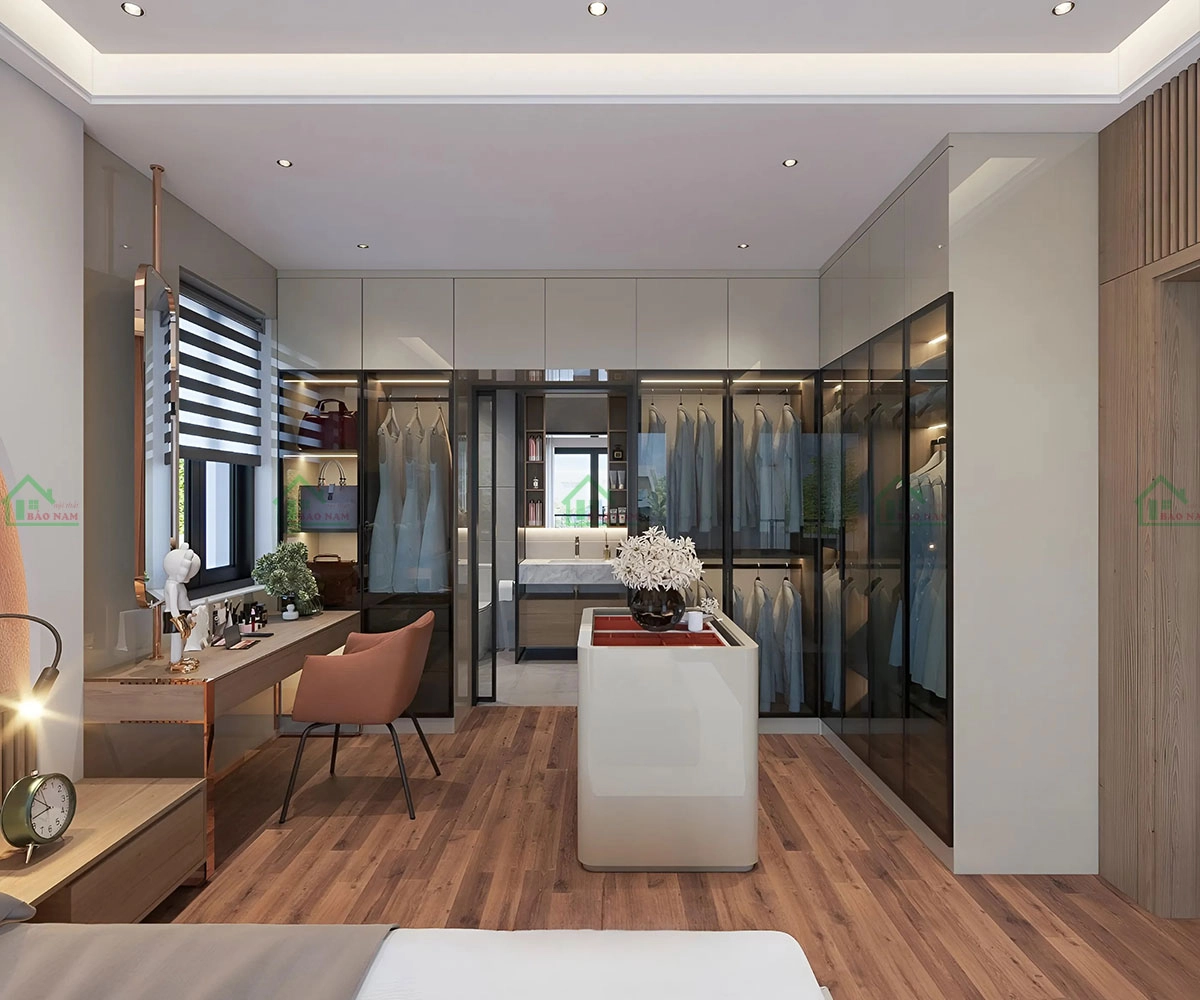 Phòng ngủ được thiết kế hiện đại với tủ quần áo và bàn trang điểm tích hợp, mang lại sự tiện nghi và sang trọng.
