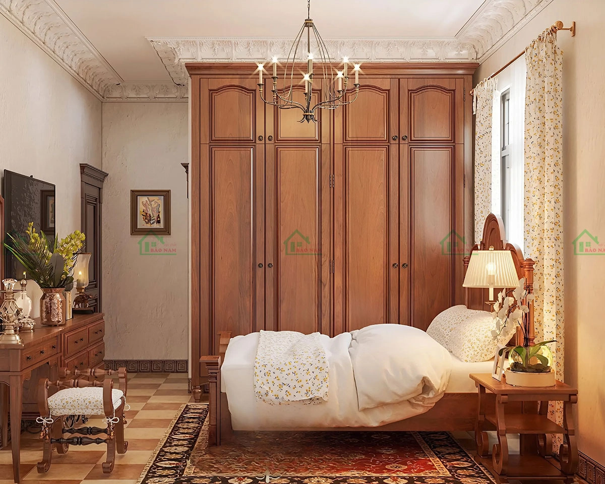 Tủ quần áo gỗ tự nhiên cao cấp, thiết kế phong cách cổ điển với các đường nét chạm khắc tinh xảo, tạo điểm nhấn cho phòng ngủ