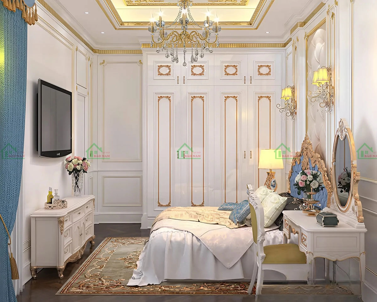 Tủ quần áo màu trắng tinh tế với các chi tiết trang trí vàng, phong cách hoàng gia cổ điển, tạo điểm nhấn sang trọng cho phòng ngủ.