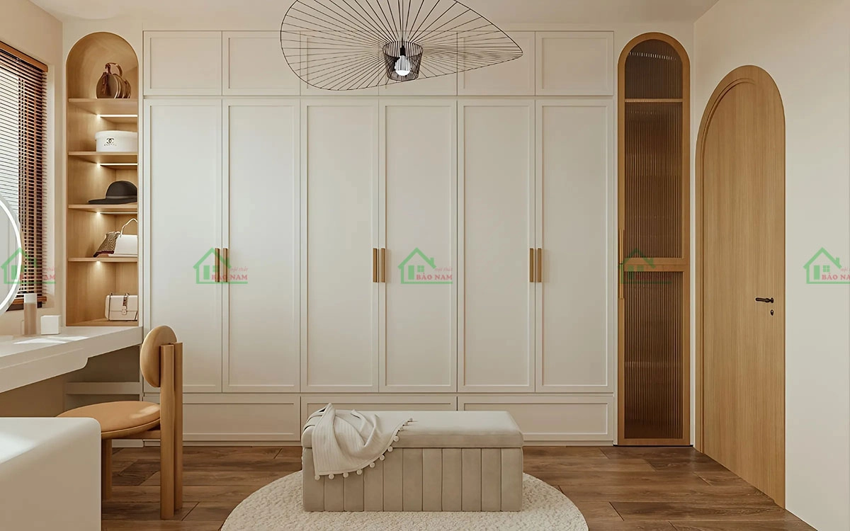 Tủ quần áo phong cách Scandinavian, kết hợp màu trắng và màu vân gỗ tự nhiên, tạo nên vẻ đẹp nhẹ nhàng và ấm cúng cho phòng ngủ