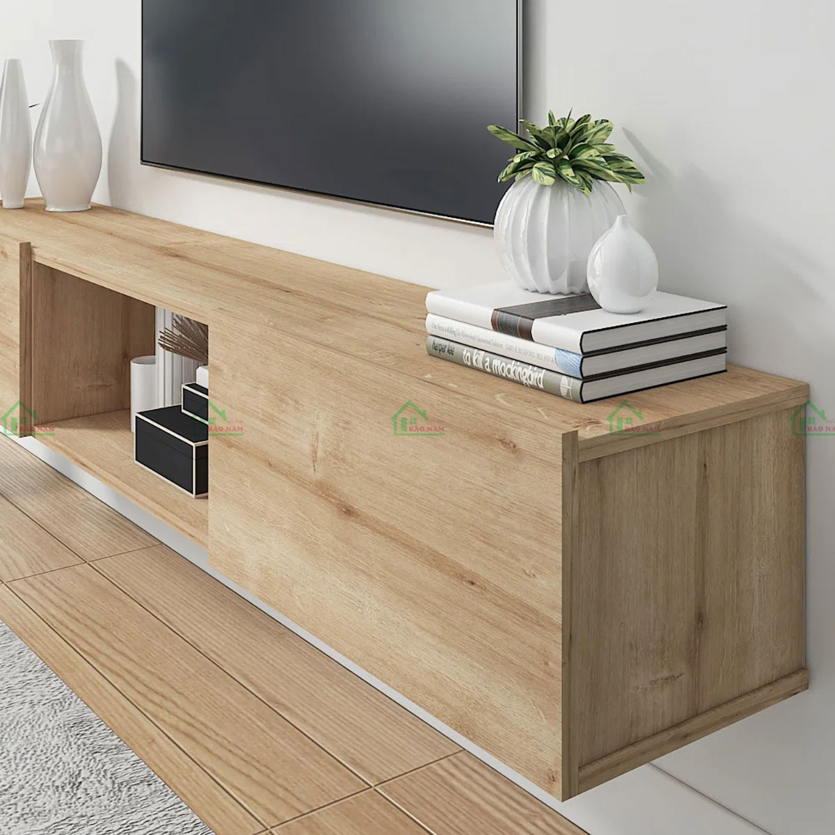 Màu sắc trung tính kết hợp giữa trắng và gỗ tự nhiên tạo sự ấm áp, sang trọng cho không gian.