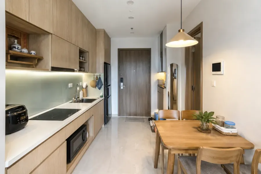 Bếp và khu vực ăn uống được bố trí liền nhau để tiết kiệm diện tích.