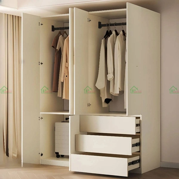 Tủ quần áo TA81 An Cường mở cửa, không gian treo quần áo và ngăn kéo, thiết kế trắng hiện đại.