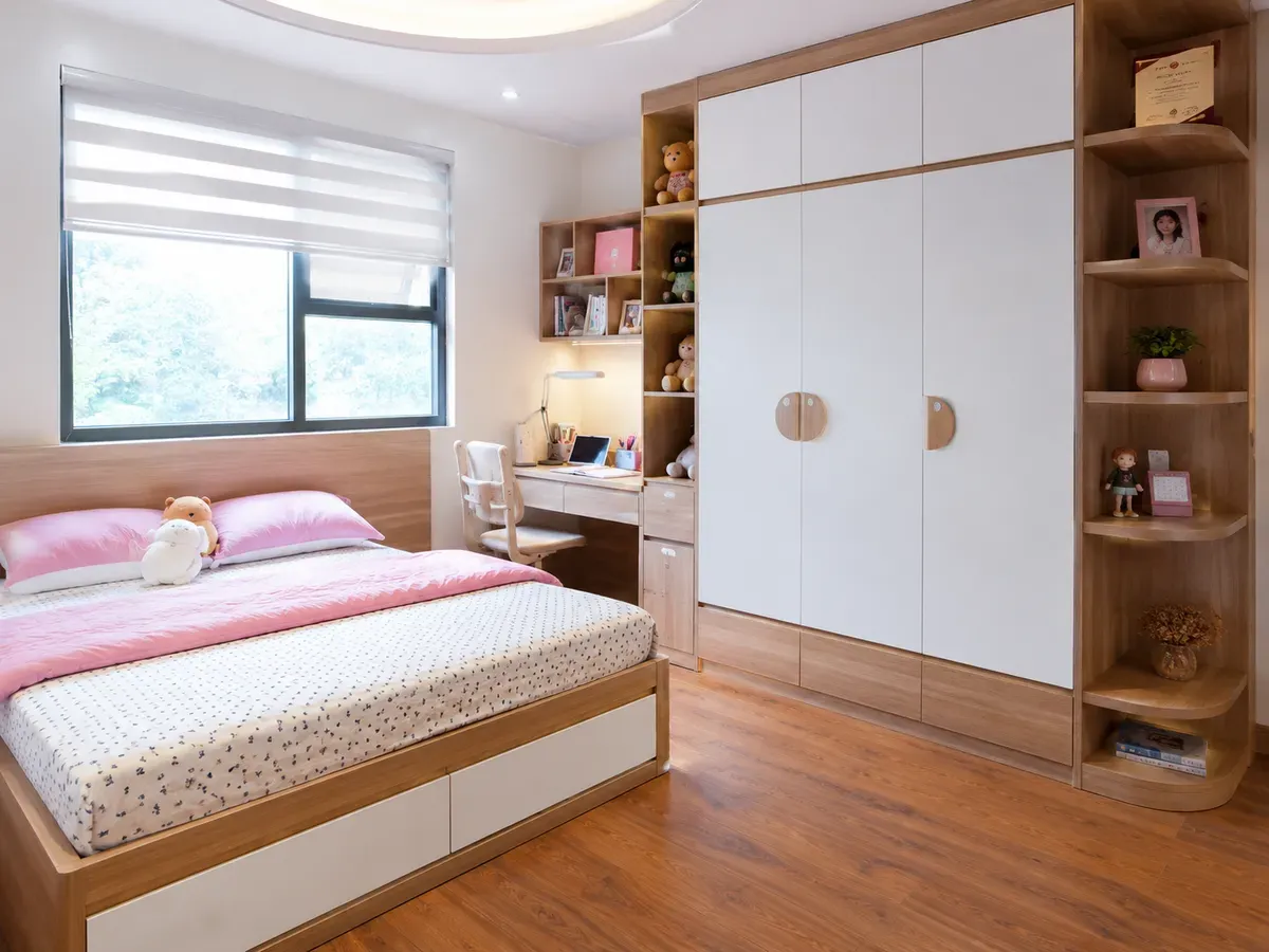 Sự đồng bộ giữa tủ quần áo và giường ngủ giúp phòng trẻ em hài hòa hơn.